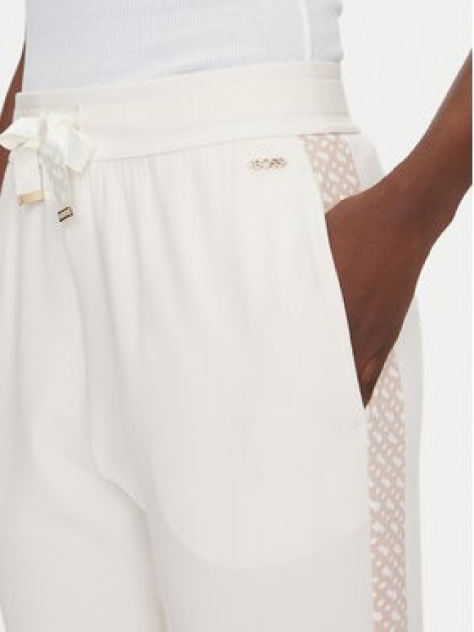 BOSS Spodnie dresowe Monogram 50535841 Écru Regular Fit