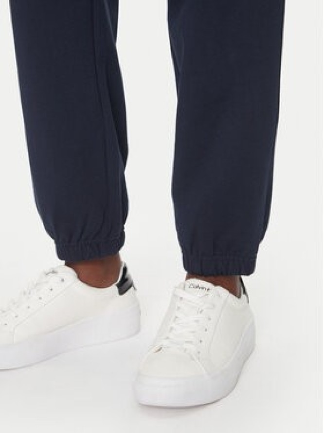 Calvin Klein Jeans Spodnie dresowe Monologo LV047B235G Granatowy Regular Fit