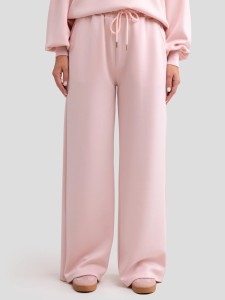 Spodnie damskie dresowe z szeroką nogawką jasnoróżowe Lunarap 600