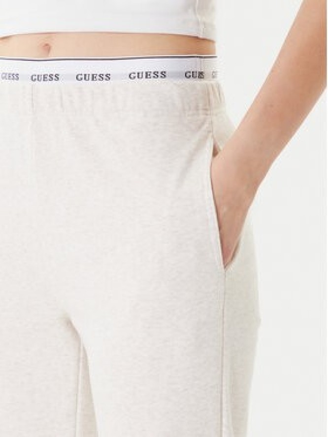 Guess Spodnie dresowe O5RB01 KCO31 Beżowy Regular Fit