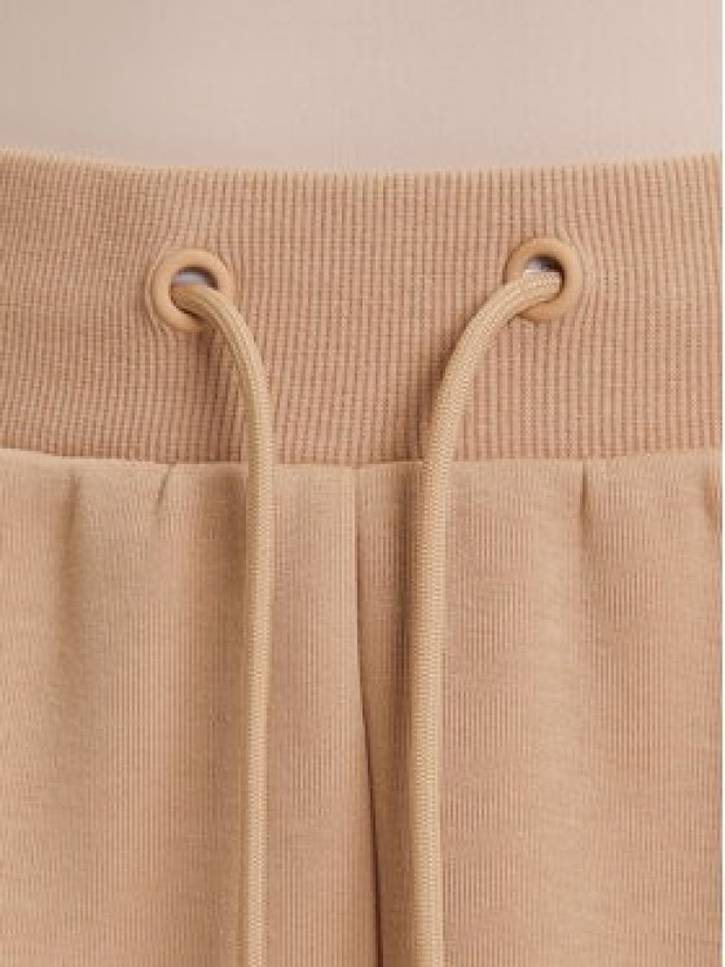 Guess Spodnie dresowe V5YB02 KB3P2 Beżowy Regular Fit