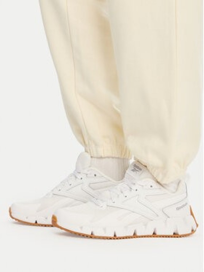 Reebok Spodnie dresowe RK25529CCW Żółty Regular Fit