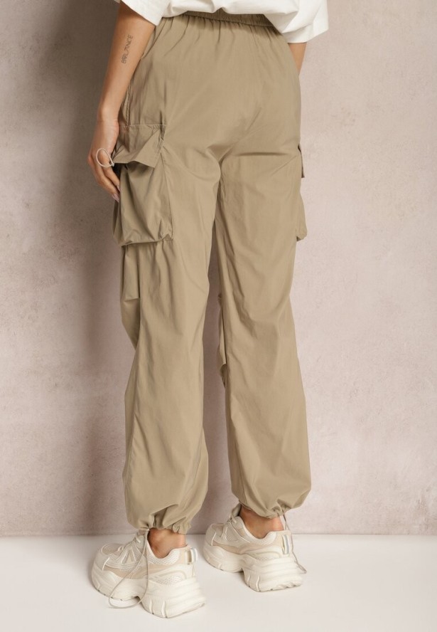 Beżowe Bojówki Spodnie ze Ściągaczami i Gumką w Talii z Kieszeniami po Bokach Laverina