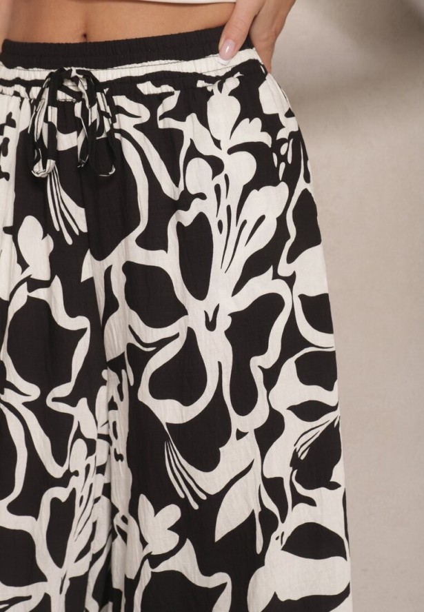 Czarne Spodnie o Szerokim Kroju High Waist w Kwiaty Nelrive