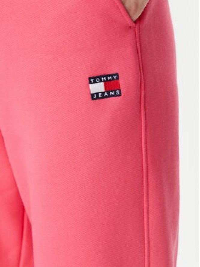 Tommy Jeans Spodnie dresowe Badge DW0DW20679 Różowy Regular Fit