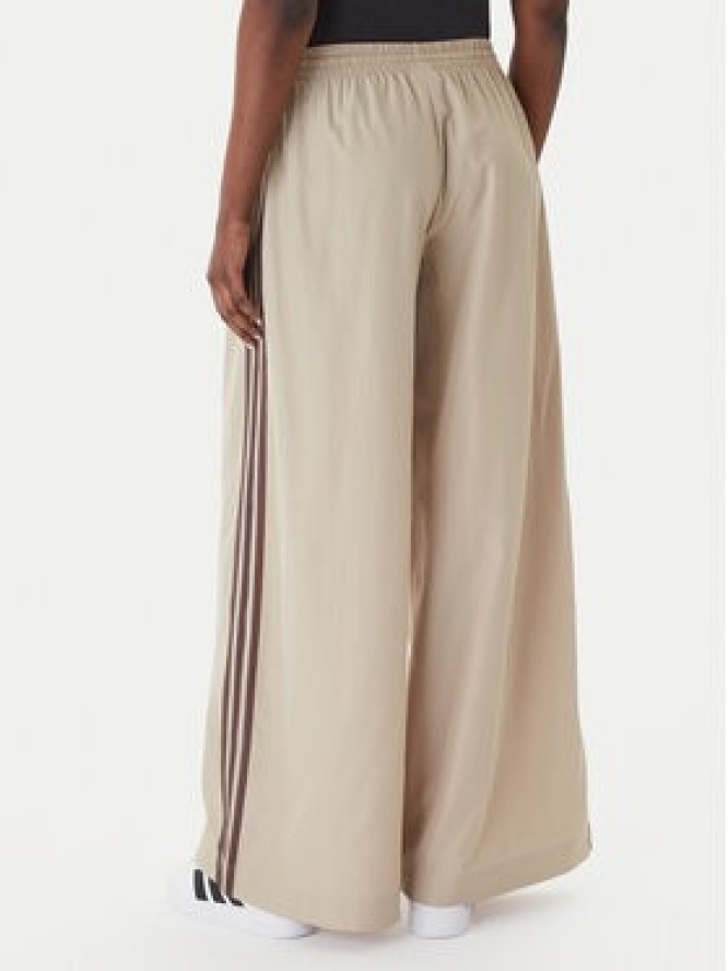 adidas Spodnie dresowe Firebird Adilenium KD6300 Beżowy Regular Fit