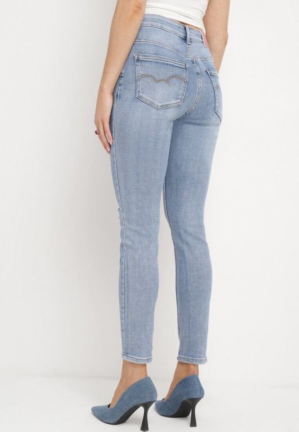 Jasnoniebieskie Jeansy Skinny z Bawełny Ozdobione Przetarciami i Dziurami Astoreta