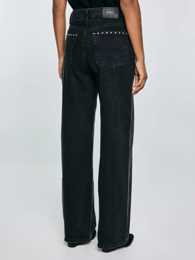 Jeansy damskie z szeroką nogawką z ozdobnymi dżetami czarne Atrea 929