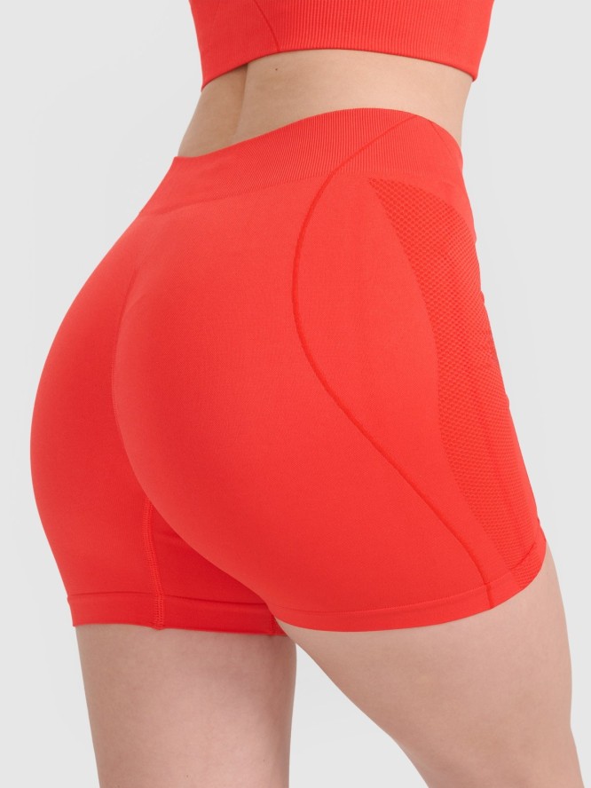 4F Legginsy krótkie bezszwowe treningowe damskie - czerwone XS/S