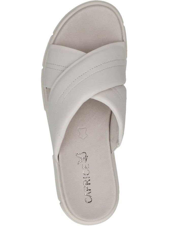 Caprice Skórzane klapki w kolorze kremowym rozmiar: 42