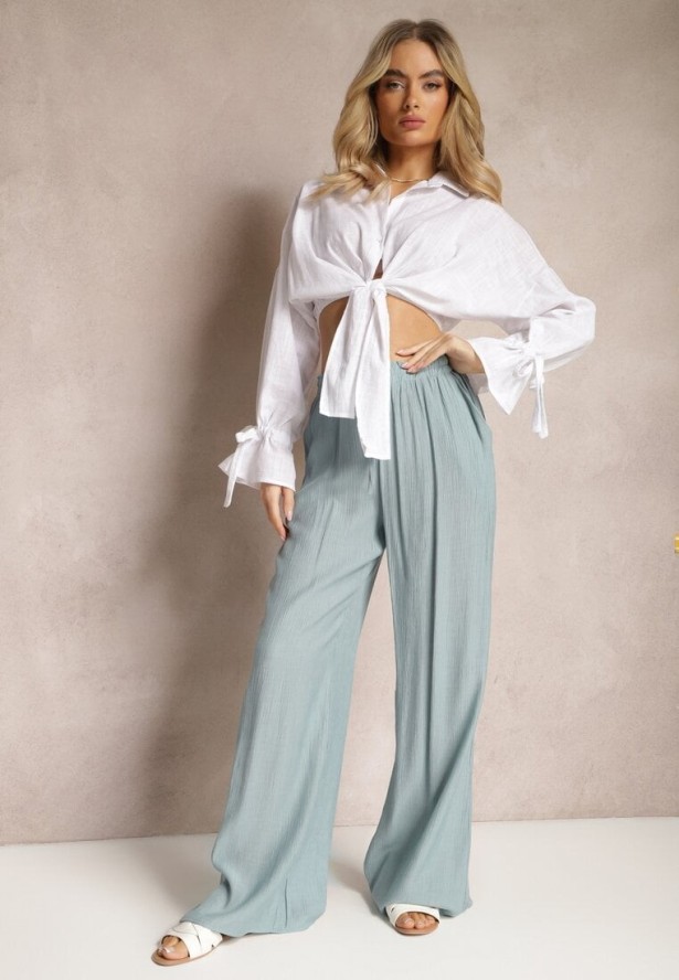 Jasnoniebieskie Szerokie Spodnie z Wiskozy i Gumką w Pasie Abyga