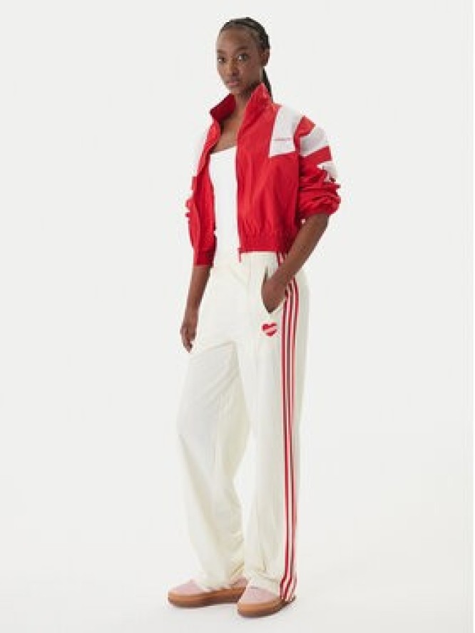 adidas Spodnie dresowe Firebird KQ8056 Beżowy Loose Fit