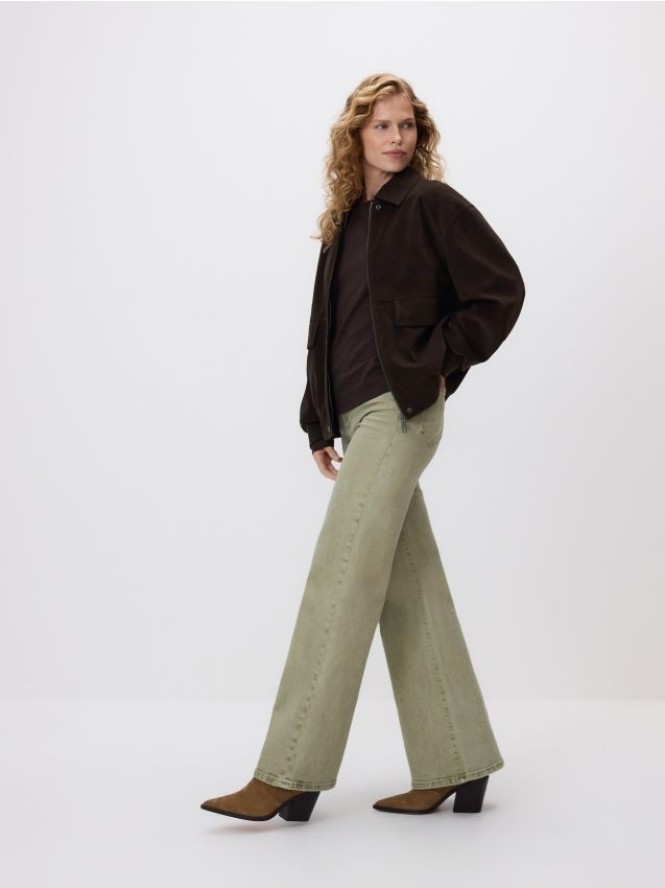 Jeansy flare z wysokim stanem - zielony