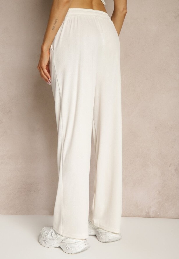 Jasnobeżowe Spodnie o Prostym Kroju z Gumką w Pasie Miritia