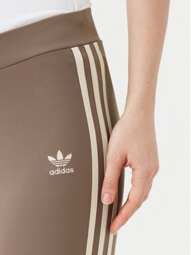 adidas Legginsy JD4601 Beżowy Flare Fit