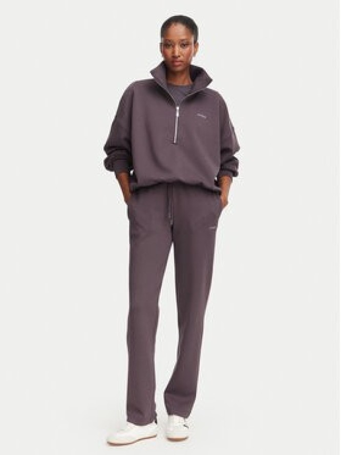 Guess Spodnie dresowe V6YB25 K4803 Brązowy Regular Fit