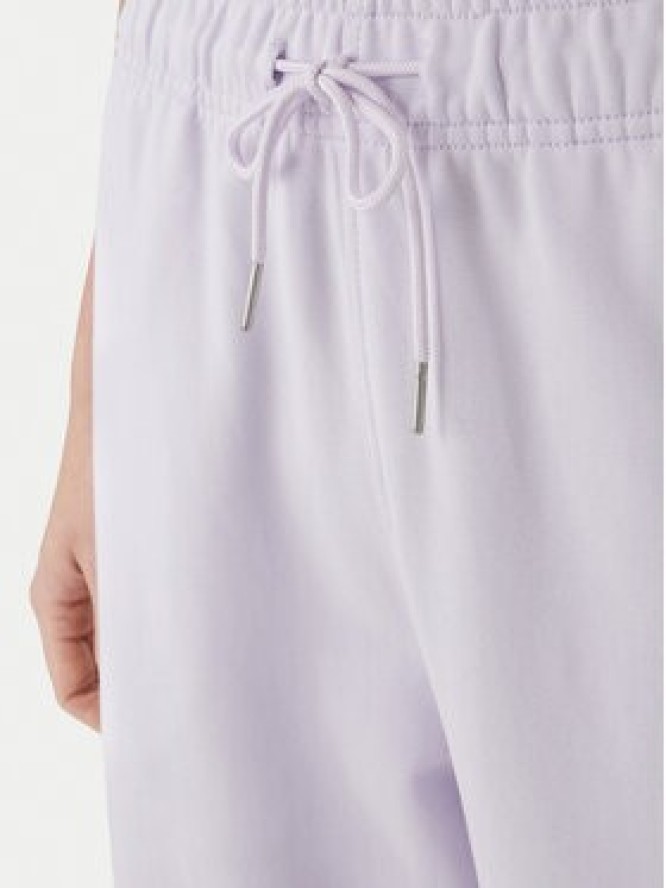 Calvin Klein Jeans Spodnie dresowe Embossed Monologo LV047F206G Różowy Regular Fit