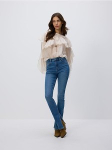 Jeansy slim fit z rozcięciem - niebieski