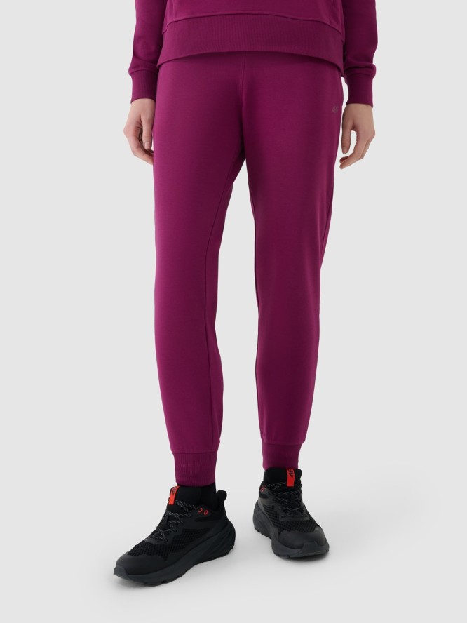 4F Spodnie dresowe joggery damskie - fioletowe XS