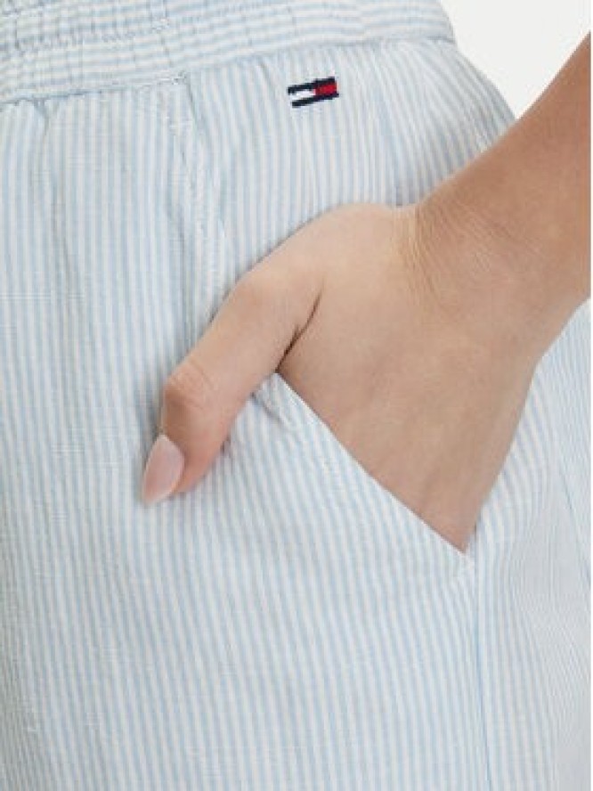 Tommy Jeans Spodnie materiałowe DW0DW22285 Niebieski jasny Loose Fit