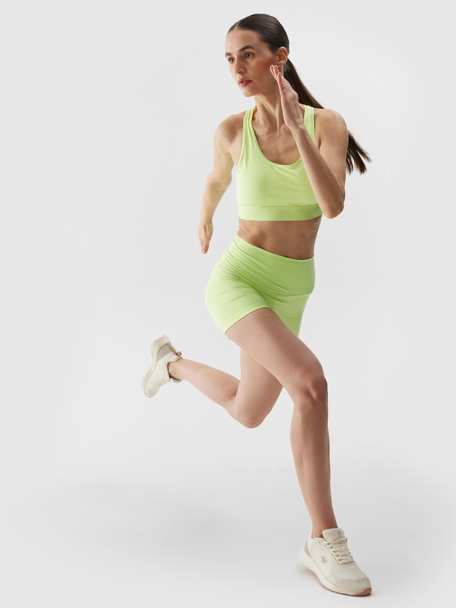 4F Legginsy krótkie treningowe z materiału z recyklingu damskie - zielone L