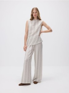 Luźne spodnie z metalizowaną nitką - beżowy