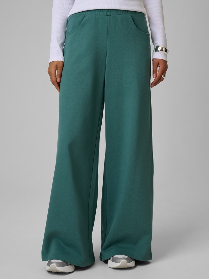 4F Spodnie dresowe z szerokimi nogawkami damskie - turkusowe XL