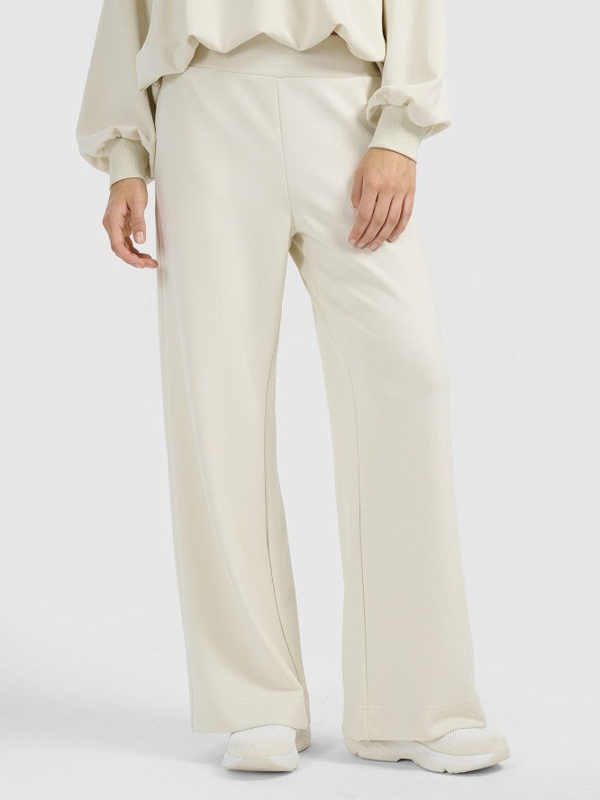 4F Spodnie dresowe z szerokimi nogawkami z modalem damskie - beżowe L