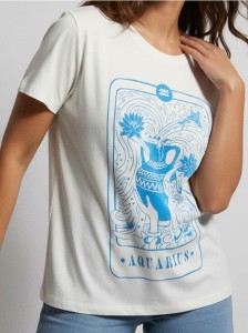 Bawełniana koszulka z nadrukiem - kremowy