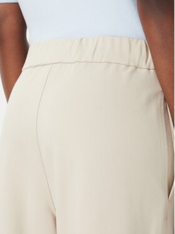Calvin Klein Spodnie materiałowe LV044G210G Beżowy Relaxed Fit