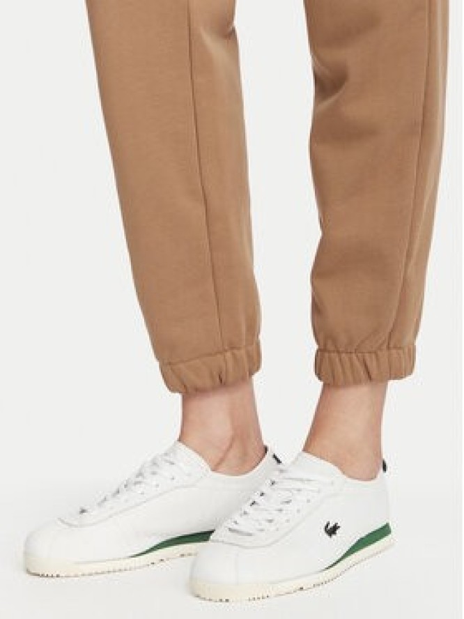 Lacoste Spodnie dresowe XF5268 Beżowy Regular Fit