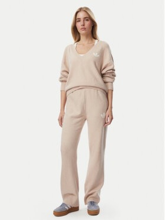 adidas Spodnie dresowe Essentials KR9180 Beżowy Loose Fit