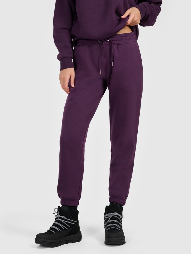 4F Spodnie dresowe joggery damskie - fioletowe XL