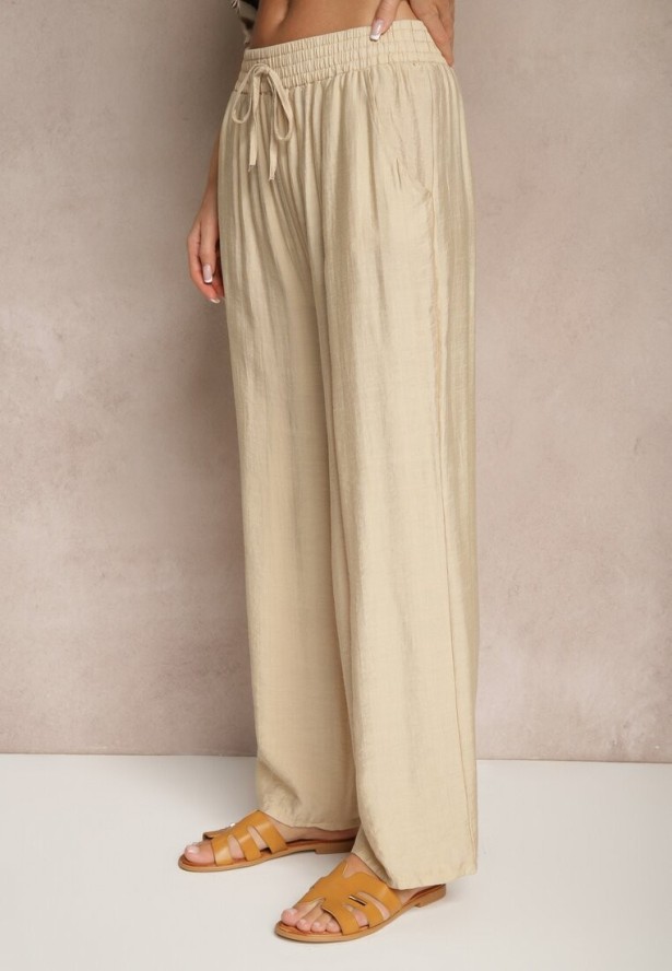 Beżowe Spodnie Typu Palazzo o Szerokim Kroju High Waist Ozdobione Wiązaniem Yaslevia