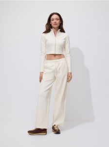 Szerokie spodnie dresowe - jasnożółty