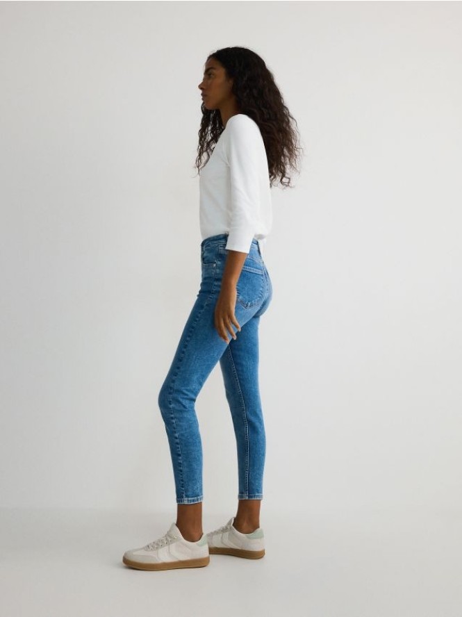 Jeansy slim fit ze średnim stanem - niebieski