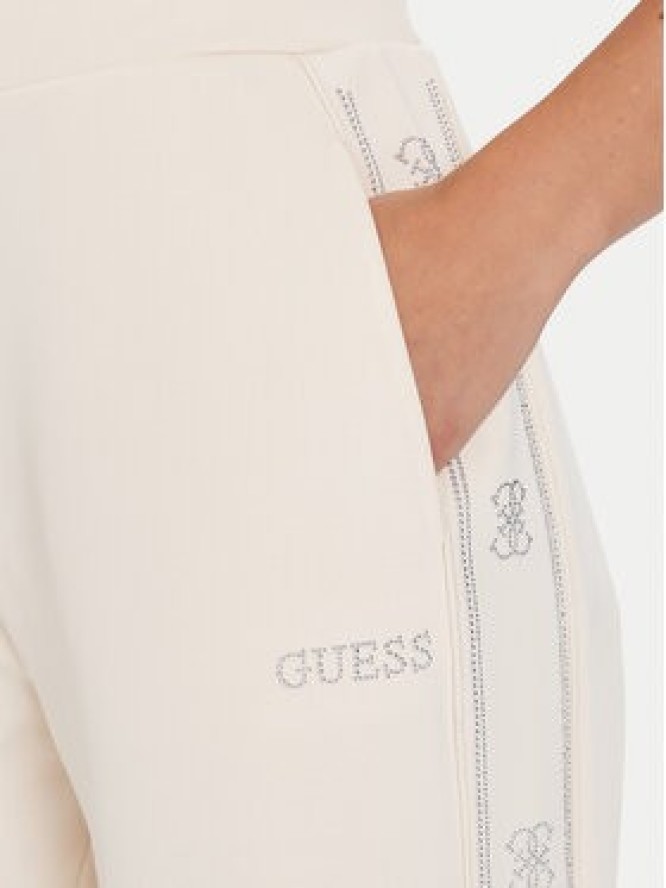 Guess Spodnie dresowe V5BB12 KCX22 Beżowy Wide Leg