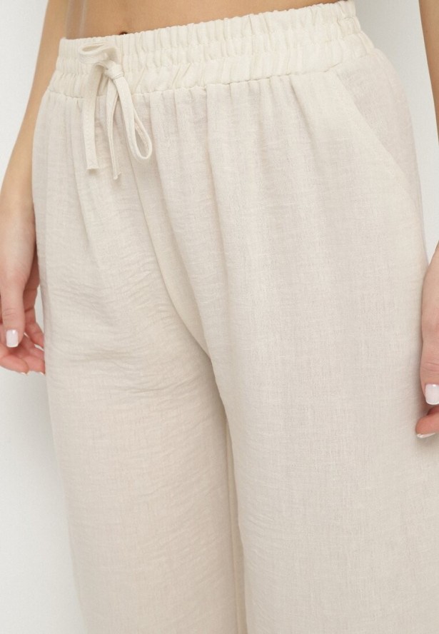 Jasnobeżowe Szerokie Spodnie z Wysokim Stanem i Wiązaniem Edirwenna