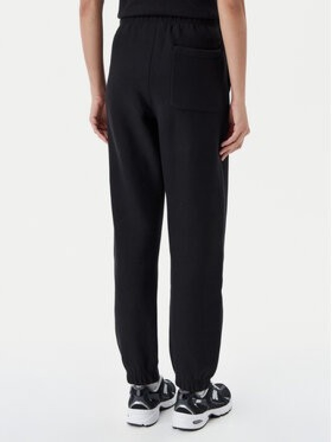 Champion Spodnie dresowe 117872 Czarny Slim Fit