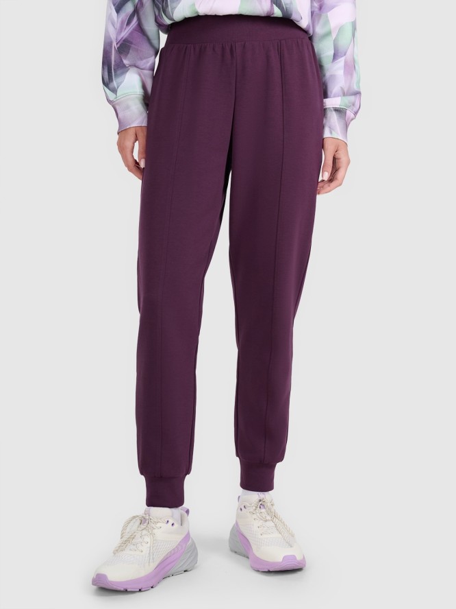 4F Spodnie dresowe joggery damskie - fioletowe M