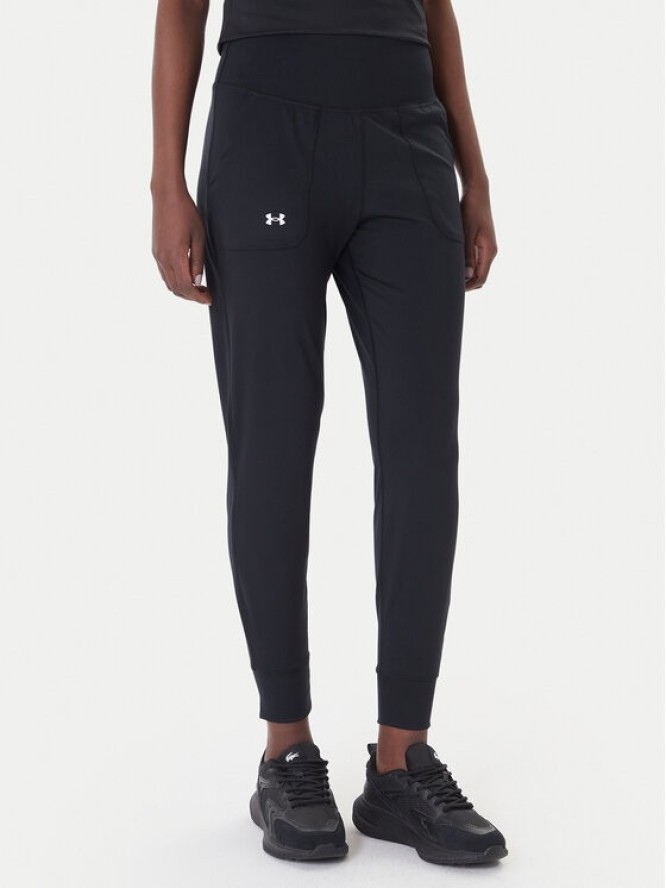 Under Armour Spodnie dresowe Motion 1375077 Czarny Slim Fit