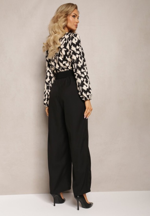 Czarno-Biały Kombinezon z Długimi Nogawkami i Kopertowym Dekoltem oraz Paskiem z Gumy Koretta