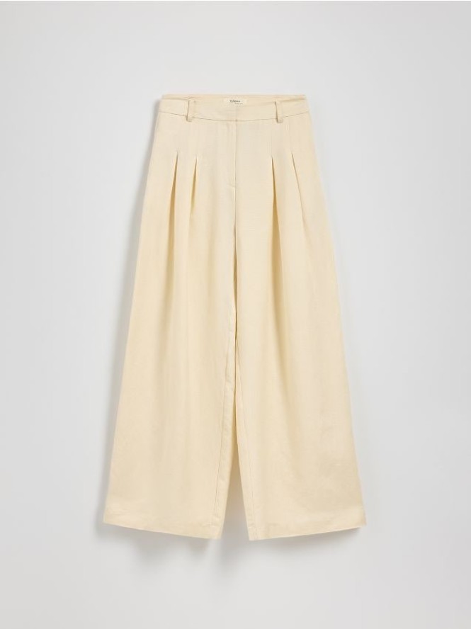 Szerokie spodnie z lnem - kremowy