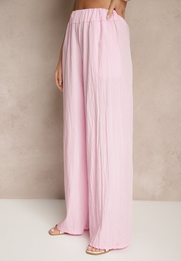 Różowy Komplet z Wiskozą Spodnie o Szerokim Kroju i Bluzka z Baskinką Evellimi