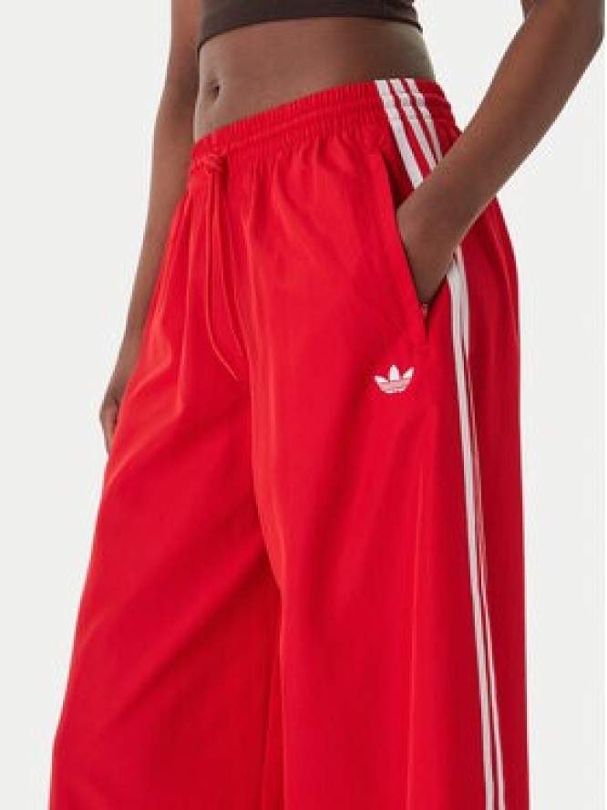 adidas Spodnie dresowe Firebird Adilenium KD6299 Czerwony Regular Fit