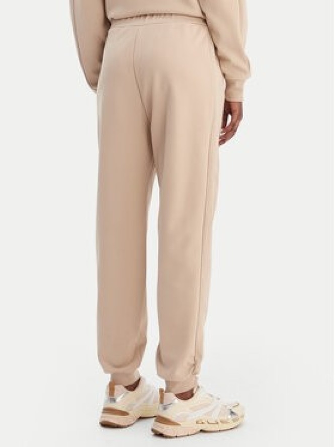 Guess Spodnie dresowe V5BB23 KCX22 Beżowy Regular Fit