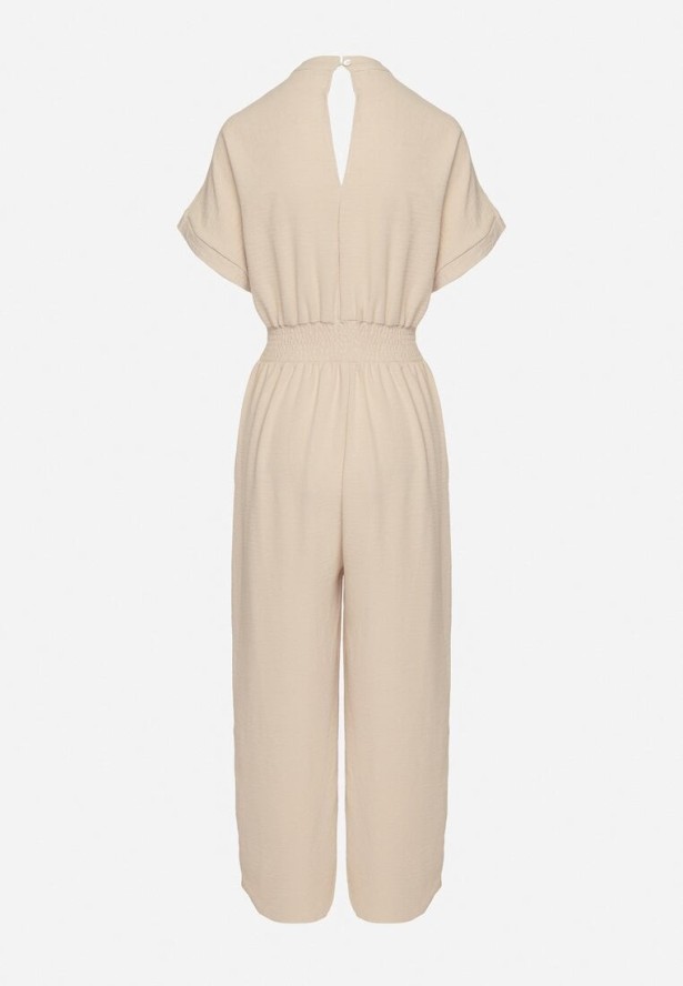 Beżowy Kombinezon z Wiskozy z Gumką w Talii i Dekoltem w Serek z Guzikami Nisella