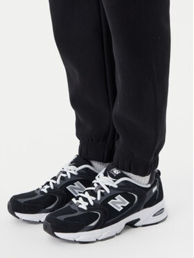 Champion Spodnie dresowe 117872 Czarny Slim Fit