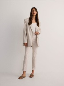 Spodnie cygaretki w kant - beżowy