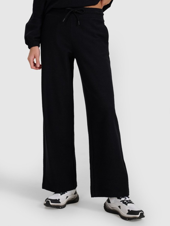 4F Spodnie dresowe z dzianiny strukturalnej damskie - czarne M